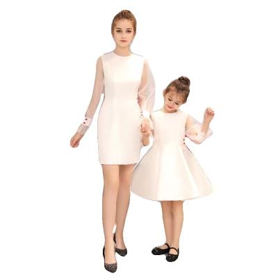 China Lovely Viable White Bow Parent Child Clothing Stage Show Costumes Mother Daughter Dress Parent Child Clothes for sale