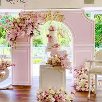 China Decorations Customized Fashionable Wedding Decor Stand Curved Arch Wedding Party Supplies Decoration Stage Backdrop for sale