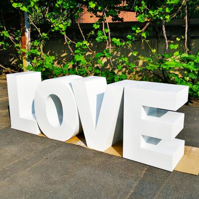 China Wedding Party Event Decoration Acrylic Metal Love Table Base Letters Wedding Decoration for sale