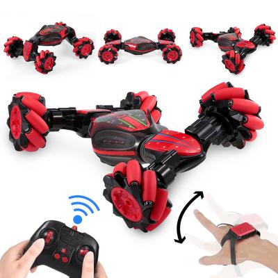 China RC Toy Car Model Electric Toy With Lights Stunt Rolling Hand Gesture Rising Remote Control for sale