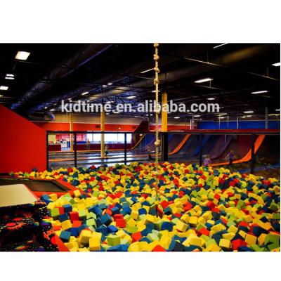 China Galvanized Tube + PP + Spring Sponge Park With Big Trampoline Pit Cubes Foam Cube for sale