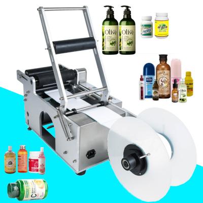 China Food Labeling Machine Whiskey Bottle Instruction Label Sticker Semi Automatic Manual Labeling Machine for sale