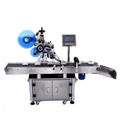 China Food bag automatic apartment labeling machine labeling machine automatic flat flat surface labeling machine for sale