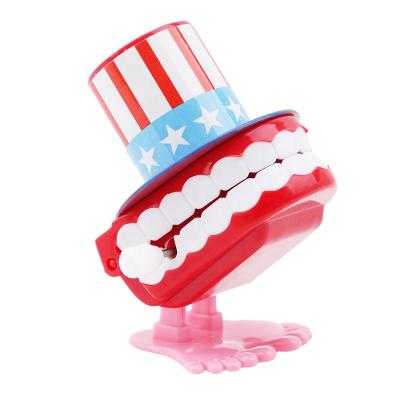 China Clock Wok Beautiful Low Price Dental Clinic Gift Jump Teeth Chains Tooth Toys for sale