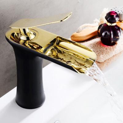 China Sense Faucets Modern Design New Black And Gold Bathroom Faucet Brass Basin Taps Brass Hot And Cold Waterfall Mixer Hotel Apartment for sale