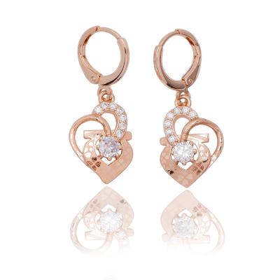 China Latest Designer Inspired Classic Women Jewelry Champagne Gold Plated Drop Zircon CLASSIC Earrings for sale