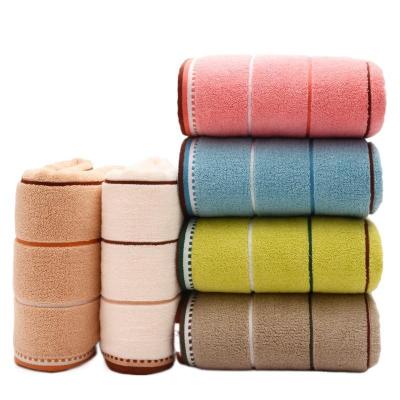 China Compressed Decorative Bath Towel Set 100% Cotton Pure Bath Towel Luxury Eye-Catching Design Colorful Bath Towel for sale