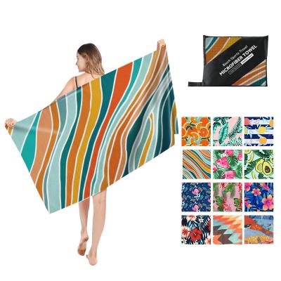 China Compressed Print High Quality Beach Towels With Logo Custom Beach Towe Water Absorption Sand Free Microfiber for sale