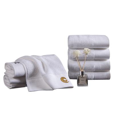 China Compressed China Wholesale Customized Embroidery Logo White Towel Set Spa Luxury 100% Cotton Bath Towels Hotel Towels Popular for sale