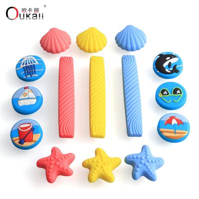 China Oukali's Beautiful Contemporary Mini Dresser Knobs Heart Star Rubber Silica Form Nursery Furniture Drawer Pulls and Knobs for sale