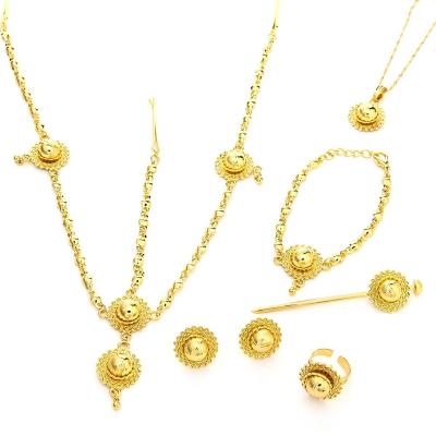 China Popular Gold Color Ethiopian Necklace Round Dangle Earrings Ring Hairpin Bracelet Hair Chain Christian Jewelry Set for sale