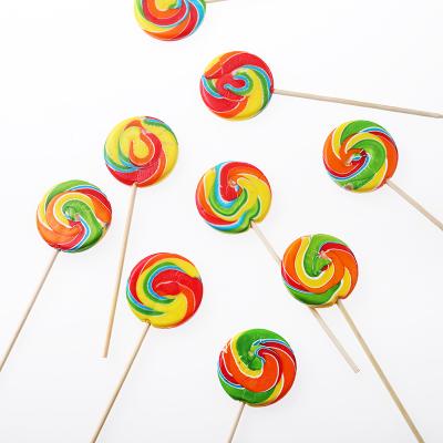 China Wholesale Natural Halal Colorful Christmas Lollipops Rainbow Fruit Soft Hard Candy for sale