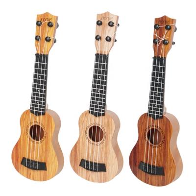 China Nanyang Wooden Wholesale Cheap Price Custom 21 Inch Soprano Sapele Ukelele Mahogany Wood Ukulele for sale