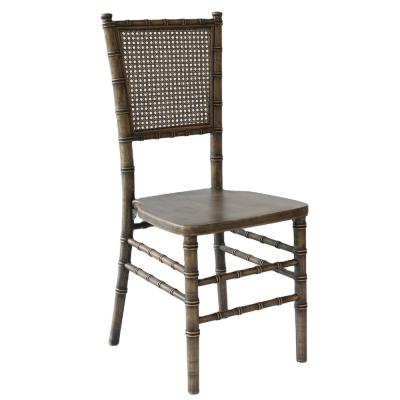 China New Stackable Wedding Rattan Chair For Restaurant Catering Dining Chair for sale