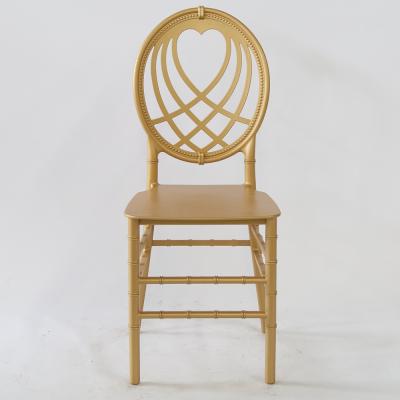 China Stackable PP Bake Plastic Resin Painted Gold Diamond Heart Back Chair For Event for sale