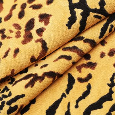 China Tear-Resistant Most Popular Sustainable Material CEY Tiger Print Poly Woven Polyester Dress Fabric for sale