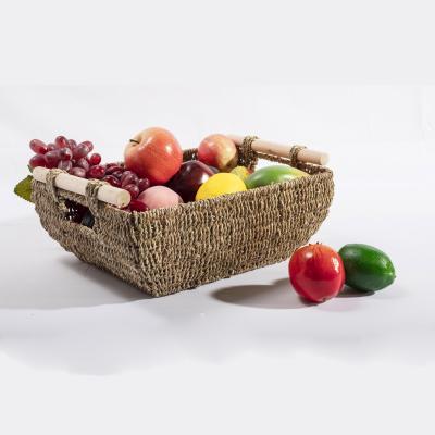 China HBK Vegetal Plankton Sustainable Boat Shape Natural Rattan Storage Basket With Wooden Handle zu verkaufen