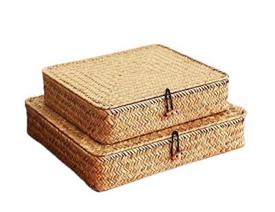 China Sustainable Natural Plant Plankton Straw Handmade Rattan Small Large Basket Boxes Universal Home Organizer Storage Bins Boxes With Lid à venda