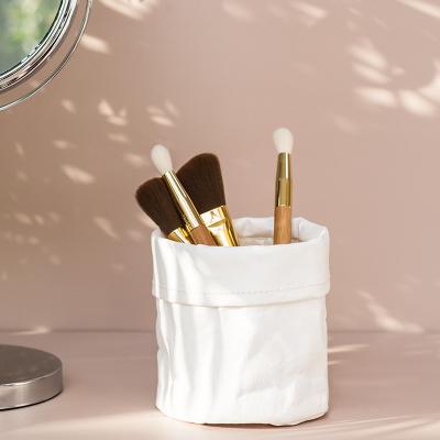 China Recyclable INS Makeup Brush Lipstick Bucket Storage Basket Dustproof Box Wrapping Paper Mask Brush Desktop Pouch for sale