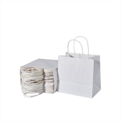 China Eco Friendly Recycled Materials Kraft Paper Clothing Packaging Bag Kraft Paper Gift White Bags With Logo for sale