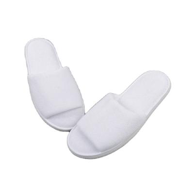 China Best Solution Eco-friendly Exquisite Disposable Indoor Hotel Amenities White Colored Custom Hotel Slipper for sale