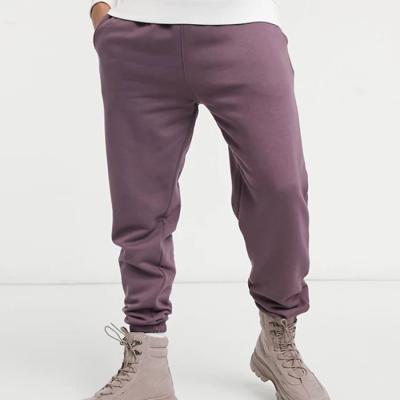 China Manufacturers Custom Logo Sweatpants Anti Pilling Simple Elastic Waist Tapered Mens Sweatpants Joggers for sale