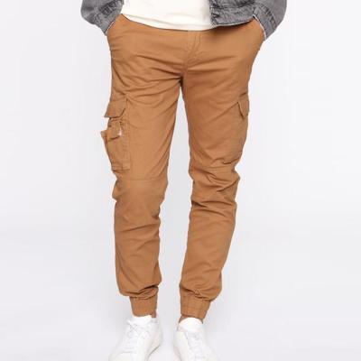 China Cheap Wholesale Custom Tactical Anti-Wrinkle Pants Solid Color Edge Mens Cargo Track Elastic Pants for sale