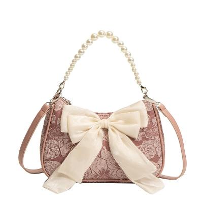 China Popular Water Resistant Pearl Armpit Bag High Quality Bowknot Design Ladies Cross - Body Shoulder Bag Women Sling Bags Customize for sale