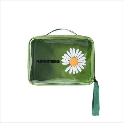 China Daisy Transparent Cosmetic Bag Top Portable Storage Bag PVC Fashion Cosmetic Toiletries TPU Bag for sale