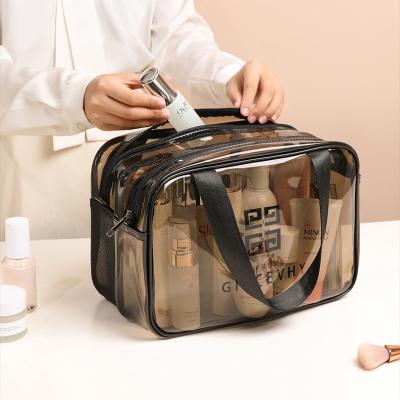 China Custom Made Separate Wet Dry Makeup Bag Transparent Double Layer Travel Storage Bath Bag PVC Wash Cosmetic Bags For Women for sale