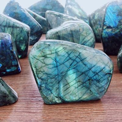 China Wholesale china feng shui crystal rough stone crafts gemstone labradorite showy polished freeform healing for home decoration for sale