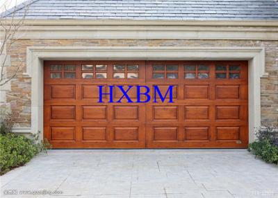 Cina La sicurezza di guida del motore ha isolato le porte di alluminio del garage del rullo con rivestimento di legno in vendita