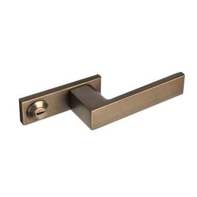 China Long-Lasting Hardware Eco lock solid wood bathroom lock cylinder indoor household silent one-line door handle for sale