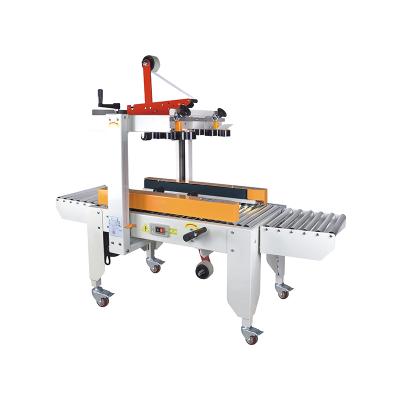 China Automatic Food Top and Bottom Drive Belt Tapeping Machine Adhesive Carton Sealer for sale