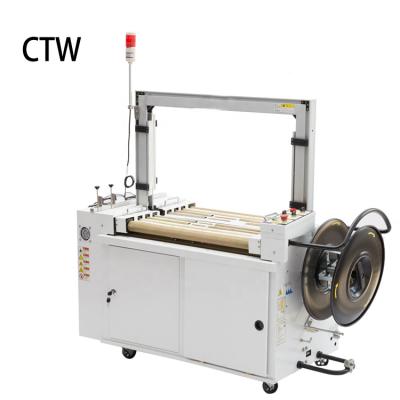 China Automatic Food Carton Sealer Automatic Strapping Machine for sale