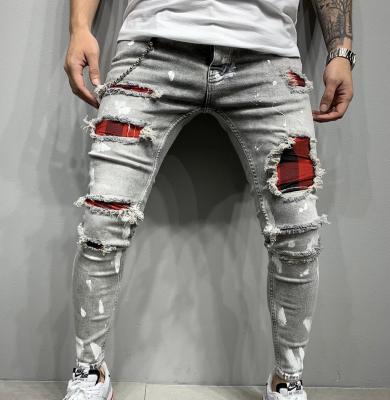 China Custom Logo Painting Skinny Ripped Men Jeans Slim Fit Patchwork Viable Jeans Long Pants for sale