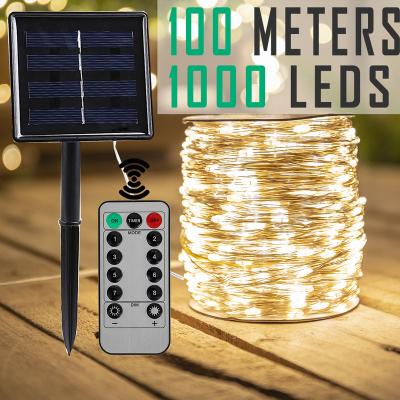 China Solar Power String Patio Lights Led 100m Solar String LED Fairy Lights With 8Modes Power Saving LED Remote Dimmable Solar Light Outdoor Waterproof Christmas for sale