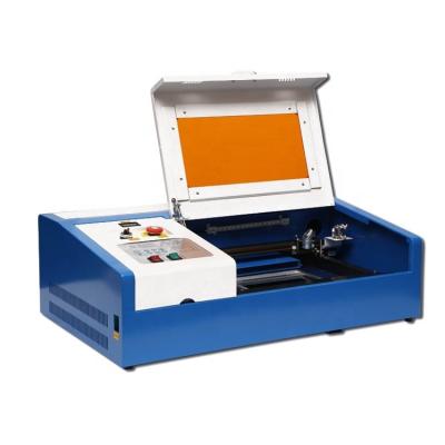 China Laser Engraving CO2 40W 3020 Laser Cutting Machine Engraving Machines For Rubber Stamp for sale