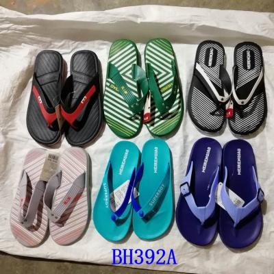 China Anti-odor Stock Lot Shoes Men Slippers EVA Beach Flip Flops for sale