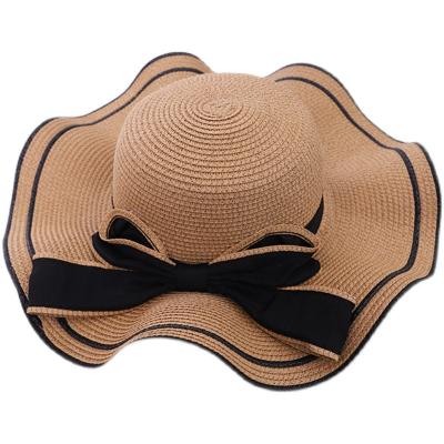 China Korean version female striped hat European and American summer big bow brim lotus leaf beach cover face sunscreen brim hat for sale