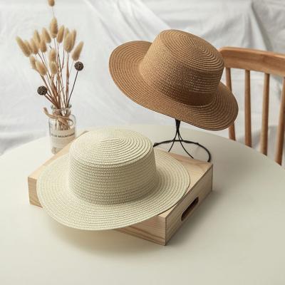 China Fashion Striped Women's Sun Straw Hat Raffia Beach Straw Summer Flat Hat Top for sale