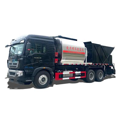 China China Brand Single Operation Price Cheap Sinotruk Howo 20-25 CBM 6x4 Asphalt Gravel Synchronous Spreader Truck For Sale for sale