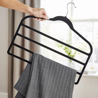 China Durable flocking pants rack assembling the plastic plastic pants hanger four-layer multi-layer trouser rack hanger storage rack for sale