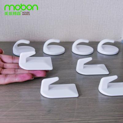 China Modern Plastic Adhesive Hooks Non-punching ABS White Strong Bearing Hooks Storage Staple Kitchen Bathroom Waterproof Storage Hook for sale