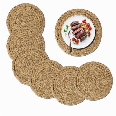 China 6 Packs Heat Resistant Non Slip Handmade Natural Water Stored Hyacinth Tablemats 6 Pack Round Weave Place Mats for sale