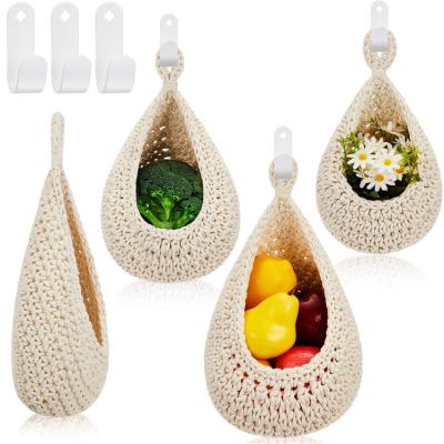 China Indian Wall Hanging Sustainable Mesh Woven Lining Fabric Cotton Basket Fruit Hanger African Baskets Vietnam Coconut Fiber Cotton Baksets for sale