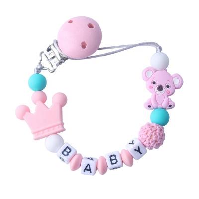 China BPA Free Colorful Custom Wooden Dummy Clip Cartoon Baby Pacifier Clip Silicon Soother Clip Holder Case for sale