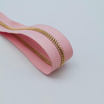 China Gold Custom Teeth Zippers Auto Lock Factory Metal 3# Long Metal Zipper Chain Pink for sale