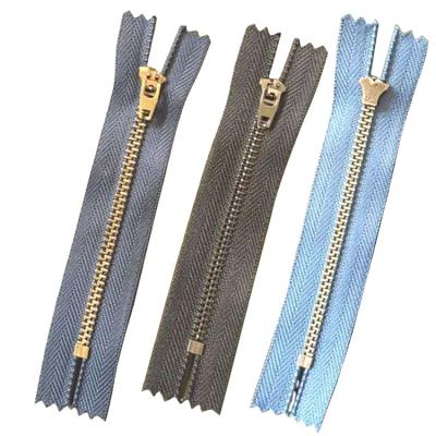 China Durable Metal Zipper Clogged Zipper For Jeans Gold #3 Brass Customized for sale