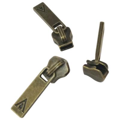 China Wholesale High Quality Antique Brass Nickel Free Zipper Slider Non Lock Bag Pull Puller for sale